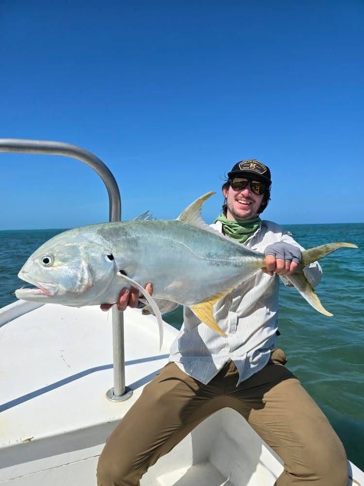 Fly fishing guide Tonn Cummins holding a fish